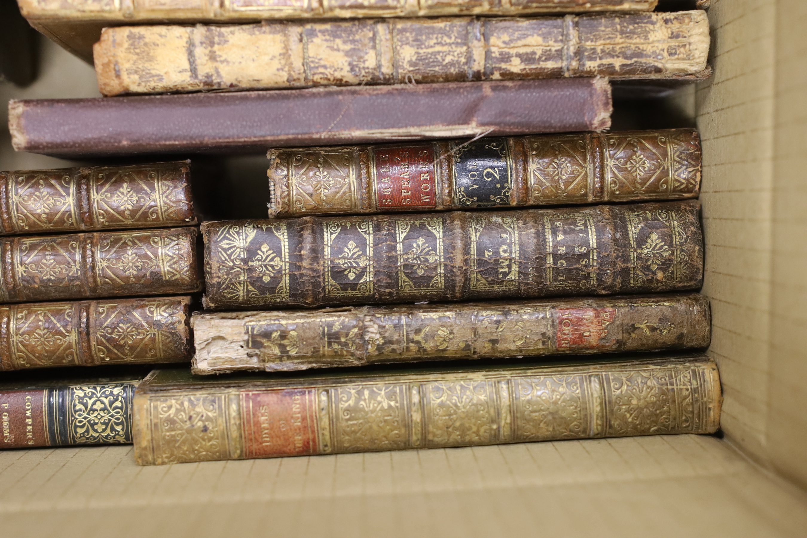 A group of assorted leather bindings
